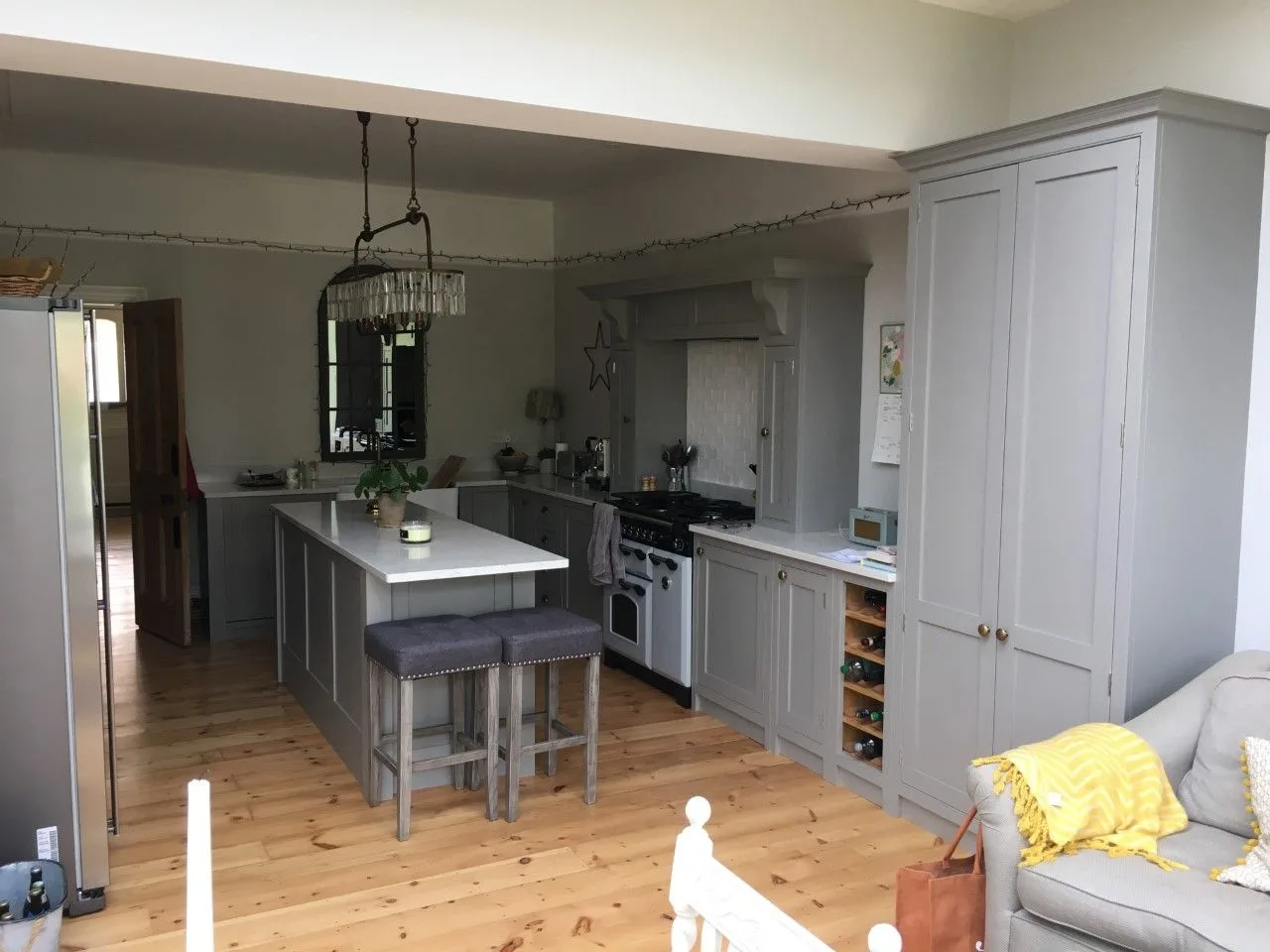Grey shaker kitchen with an island in a refurbished Southampton home