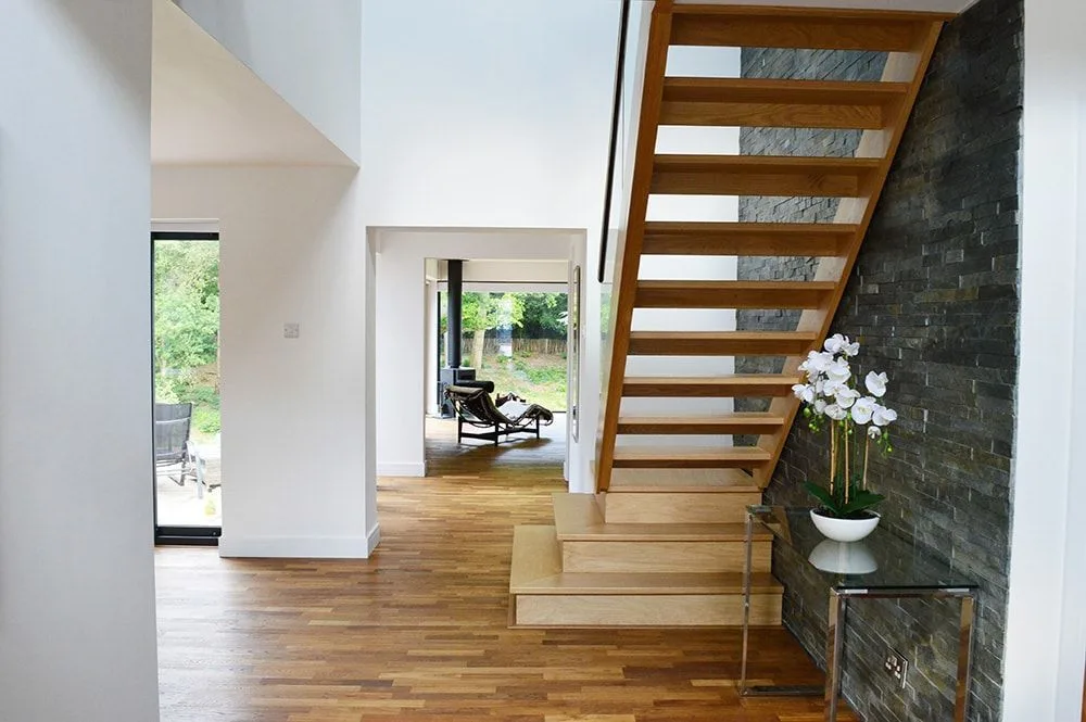 Open-tread staircase and freshly decorated hallway